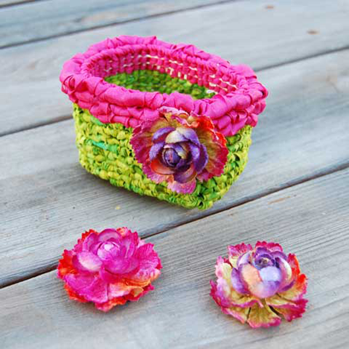 4½”W x 3”D x 3”H - Design by Theresa PulidoGift basket made with: 5-Mesh Canvas, Color Crazy Limeade fabric strips, seam binding, Windsor Roses accent.